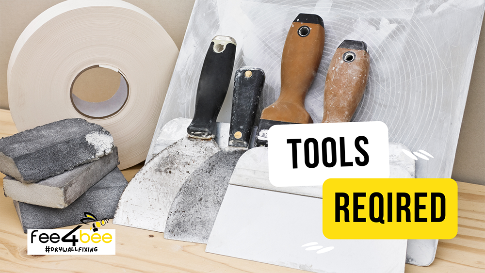 a variety of tools required to repair drywall